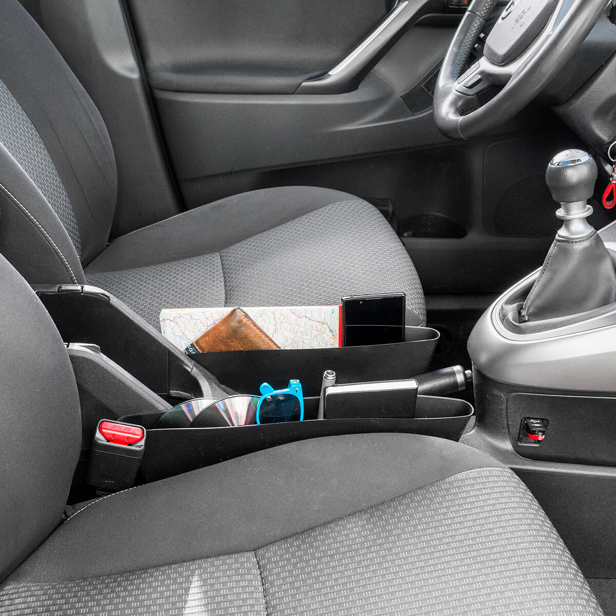 Everything Flying around in your CAR ? With this Middle console Car organizer all your Problems are solved , no more blindly looking for your phone under the Seat while driving , it'll be stored safely with the Car organizer 2.0!!!